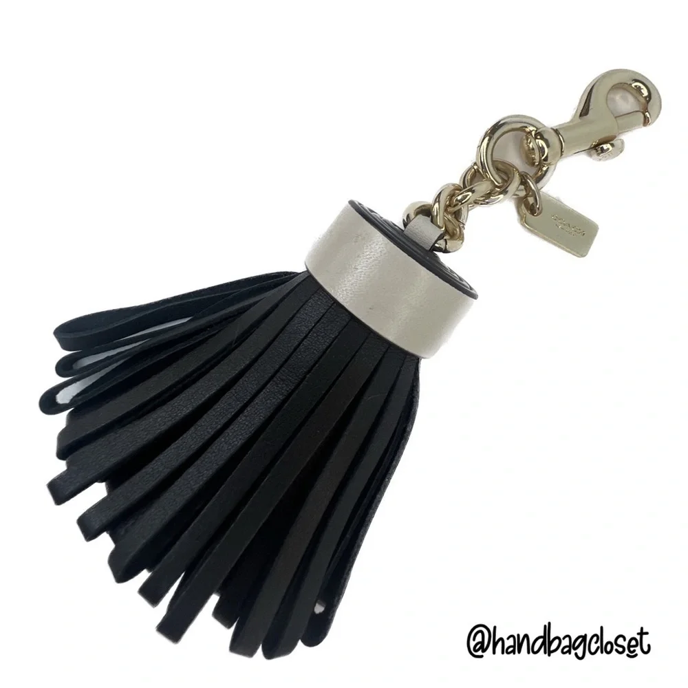 COACH LEATHER TASSEL BAG CHARM (F58505)
GOLD/BLACK KEY CHAIN KEYCHAIN - Picture 5 of 12